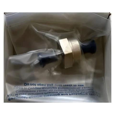 Swagelok check valve retained in a sealed protective bag with protective caps